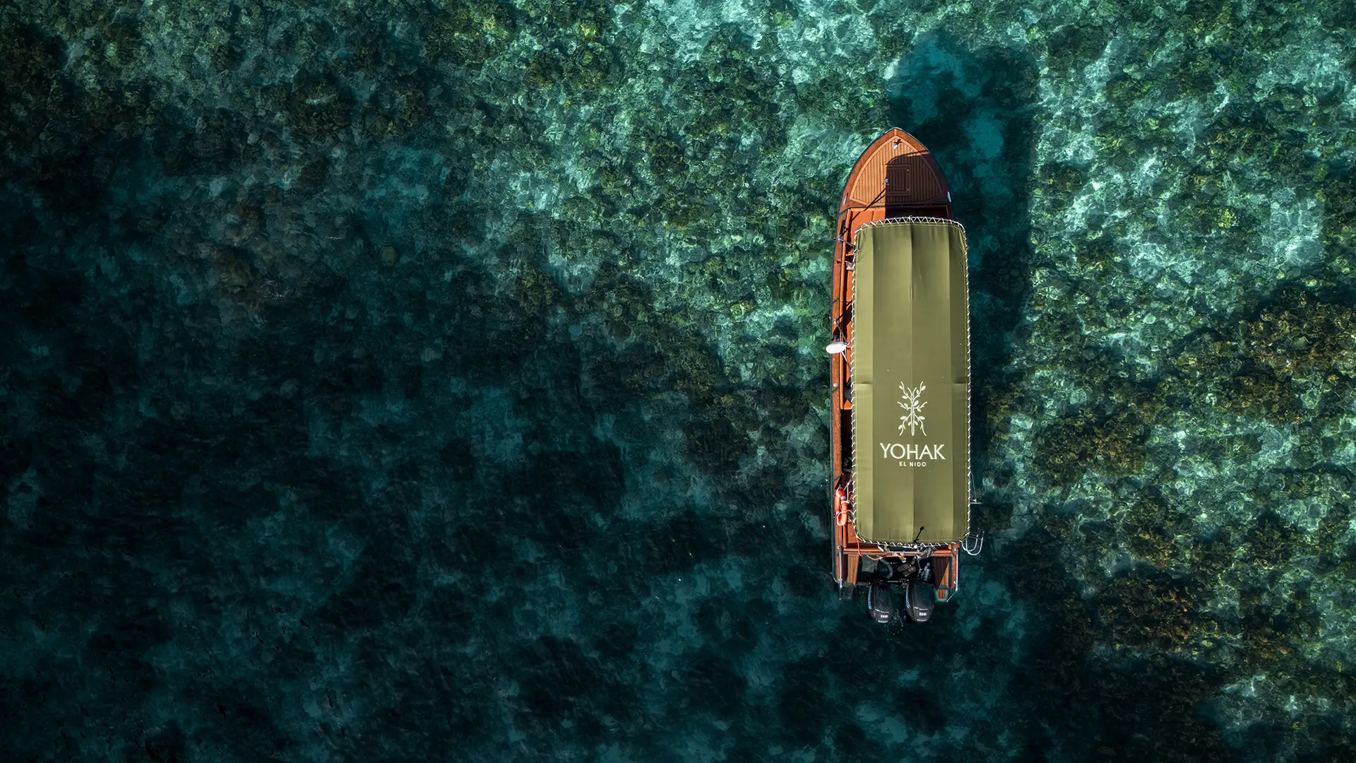 Aerial view of Yohak luxury speedboat in coral waters